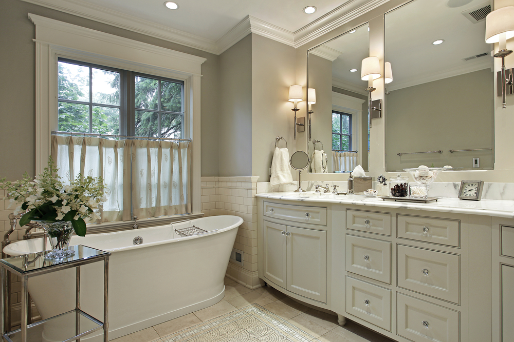 Master bath in luxury home with marble counter