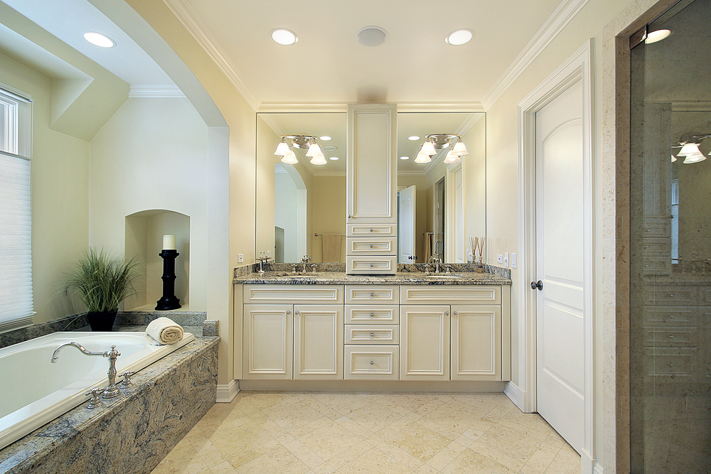 Master bath in luxury home with glass shower